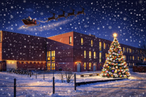 Kiekemal-Schule mit Weihnachtsbaum, Schneefall und einem Weihnachtsmann, der mit seinem Rentierschlitten über das Gebäude fliegt